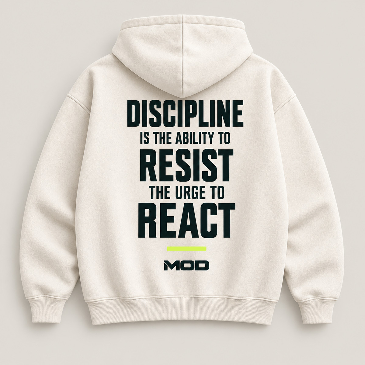 Concept ivory hoodie, back view, with “Discipline Is the Ability to Resist the Urge to React” lettering and MOD below.