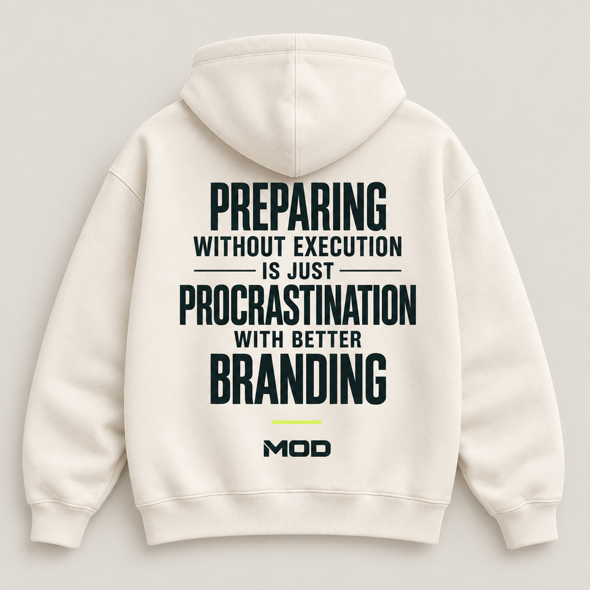 Concept ivory hoodie, back view, with “Preparing Without Execution Is Just Procrastination with Better Branding” lettering and MOD below.