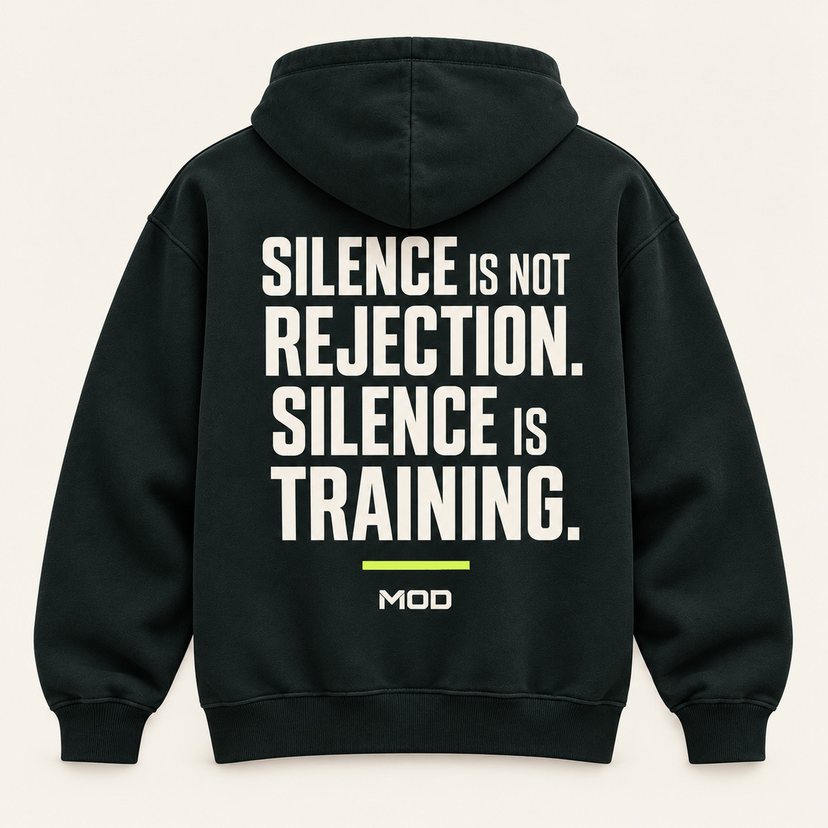 Concept ink hoodie, back view, with “Silence Is Not Rejection. Silence Is Training.” lettering and MOD below.